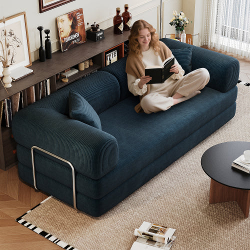 Modern Milo corduroy floor sofa in a minimalist living room setting