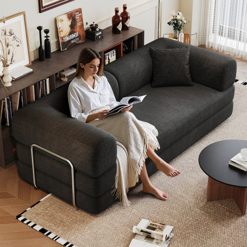 Modern Milo corduroy floor sofa in a minimalist living room setting
