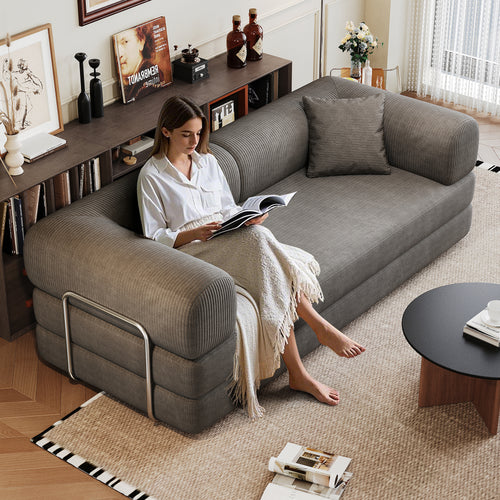 Modern Milo corduroy floor sofa in a minimalist living room setting